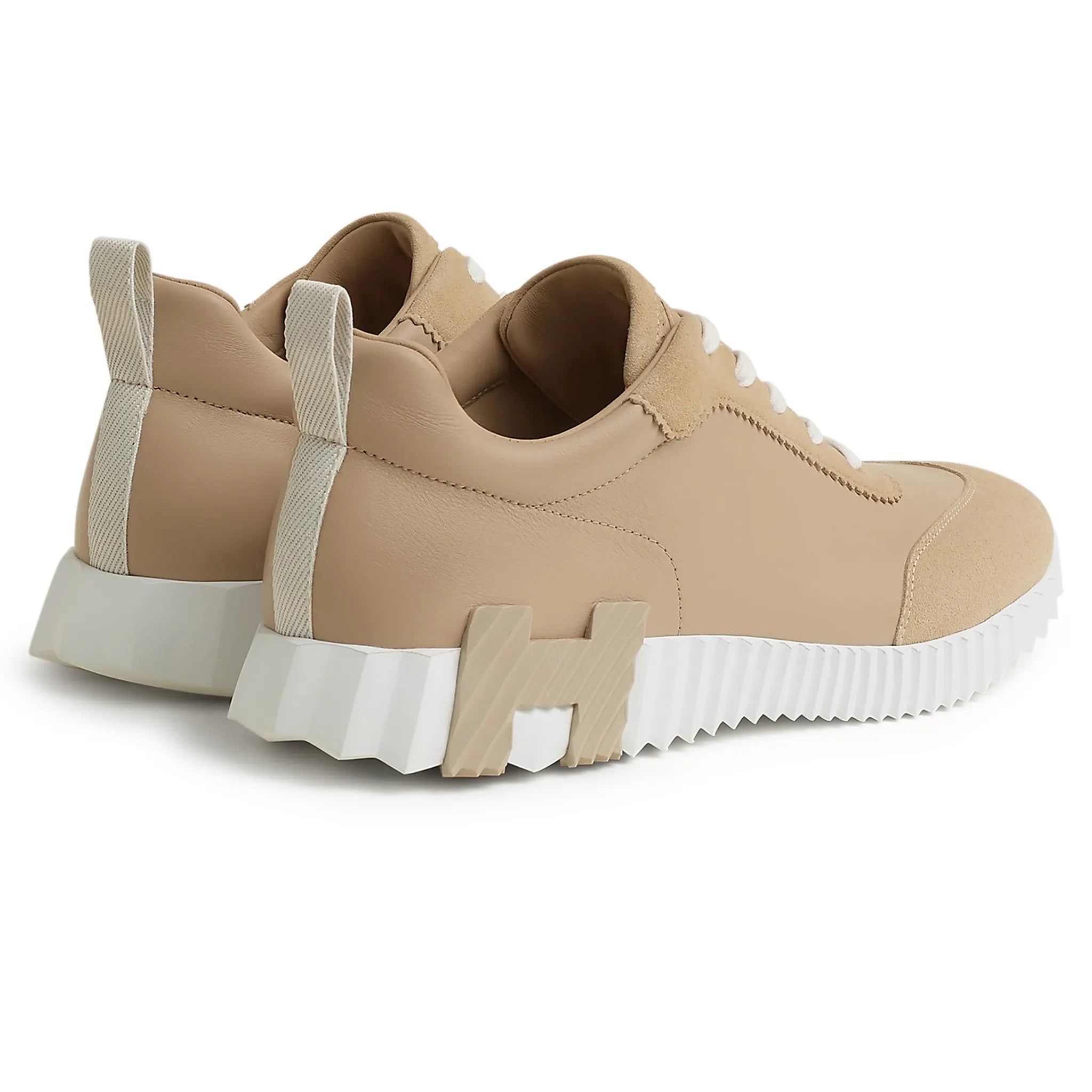 Back side view of Hermes Paris Bouncing Sneaker Beige Lin H221898ZH5K390